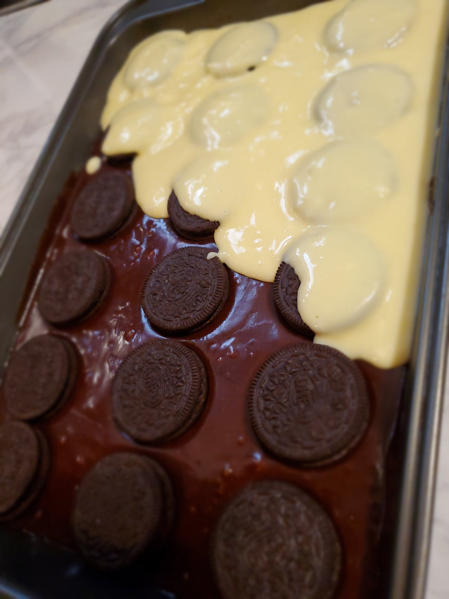 Cheesecake Brownies with OREO Cookies and Strawberries
